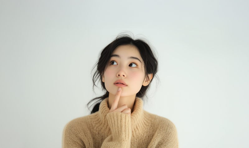 後戻りについて考える女性